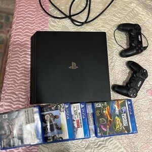 Sony PS4 Pro Console with DualShock Controllers - Black